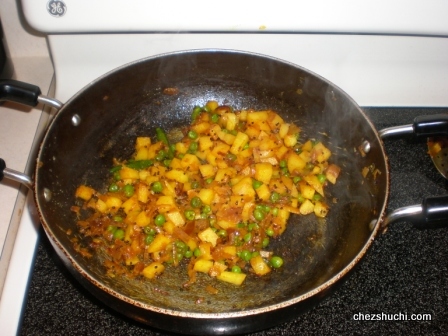 vegetables frying for poha