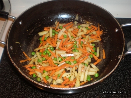 veggies frying in seasoning